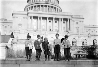 Group of newsies selling on capitol steps, April 1912