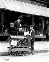 Joseph Severio, peanut vender, 11 years of age. Been pushing cart 2 years, May 1910