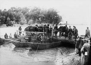 Transporting cavalry troops over the Danube River to Serbia ca. 1910-1915