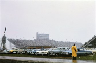 Cars parked outside Beaver Stadium for Penn State football game (possibly 1962)