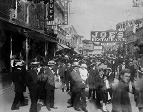 Visitors enjoying a day at Coney Island ca. 1915