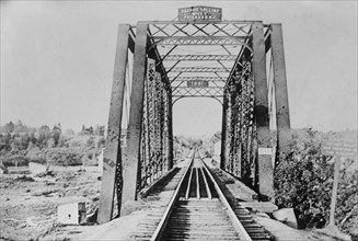 Looking across railroad bridge into Canada from Vanceboro, Maine (U.S. border) ca. 1910-1915