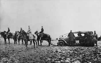 Horses pulling an Austrian army car during World War I ca. 1915