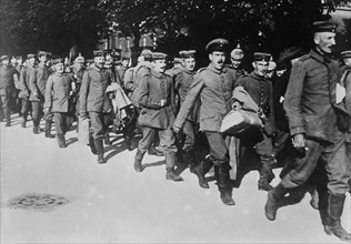 German soldiers marching and singing in the street during World War I ca. 1914-1915