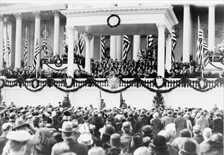 Chief Justice William H. Taft administering the oath of office to Calvin Coolidge on the east portico of the U.S. Capitol, March 4, 1925
