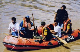 Flood rescue efforts along the Choluteca River following Hurricane Mitch, Tegucigalpa Honduras ca. 1998