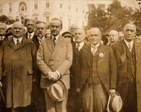 President Coolidge with an international delegation from the Scottish Rite of Freemasonry, including John Henry Cowles, the Sovereign Grand Commander, to the President's right ca. 1923-1929