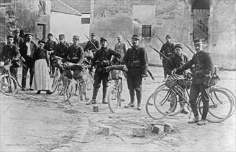 French soldiers on bicyles in Chauconin-Neufmontiers, France during World War I ca. 1914