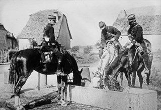 French officers watering their horses during World War I ca. 1914-1915