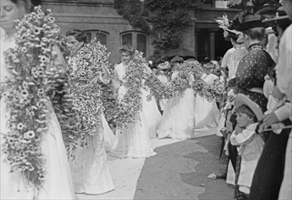 Vassar College Graduates participating in the Daisy Chain ca. June 1908
