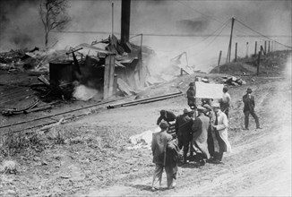 Colorado Coalfield Miners Strike of 1913-1914 - Close of Battle, Forbes, Colo. Removing dead: Correspondents under truce flag