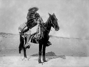 Mexican on horse, during the Mexican Revolution ca. 1910-1915