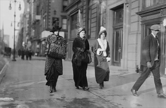 Woman taking a walk down Fifth Avenue in New York City ca. 1910-1915