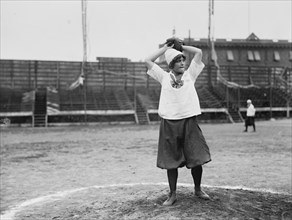 A player with the female New York Giants baseball team ca. 1913