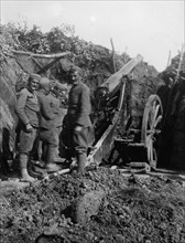 Montenegrian soldiers in a trench with artillery ca. 1910-1915