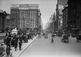 Fifth Avenue and 42nd Street, New York City on Easter day, March 23, 1913. New York Public Library on left and spires of St. Patrick's Cathedral in distance