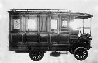 A vehicle called the Motor Chapel (a mobile chapel) used for worship services ca. 1910-1915
