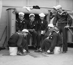 Sailors playing Acey Ducey on the U.S.S. Arkansas (BB-33) ca. 1910-1915