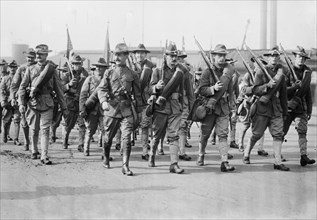 Soldiers of the 47th regiment marching to war games ca. 1910-1915