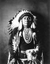 Hin-mah-too-yah-lat-kekt, also known as Chief Joseph, Nez Percé chief, in traditional dress ca. 1900