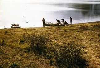7/12/1973 - Preparing to launch river exploration - Surprise Lake