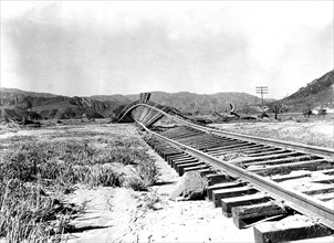 St. Francis Dam Flood on March 12-13, 1928. The flood-twisted railroad track pictured is between Castic Junction and Piru, California taken on March 18th, 1928