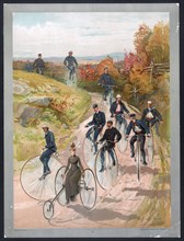 Woman, on three wheel bicycle, followed by men on high-wheelers ca. 1887