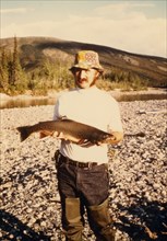 August 14, 1975 - Kobuk River Valley - Fisherman with Arctic char