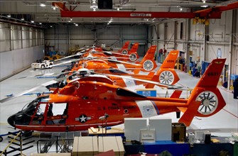 TRAVERSE CITY, Mich. (Jan. 21, 2004) All five Coast Guard Air Station Traverse City HH-65 Dolphin helicopters sit ready in the hanger in Northern Michigan.