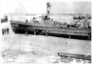 probably June 1944 - The USCG-20 was driven ashore during the storm that destroyed the artificial harbors in June, 1944.
