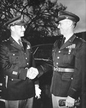 General Medaris, (left) who was a Commander of the Army Ballistic Missile Agency (ABMA) in Redstone Arsenal, Alabama, during 1955 to 1958, shakes hands with Major General Holger Toftoy (right) ca. ear...
