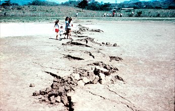 1976 - Guatemala Earthquake 1976. 'Mole tracks' track the Motagua fault where it crosses the Gualan soccer field.