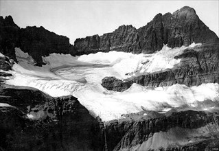 1913 - Shepard Glacier — Well-defined boundaries and crevasses are apparent in this photo of Shepard Glacier, Montana when its mass filled the cirque in 1913.
