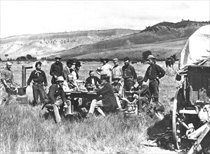 1870 Survey Crew - Group photo of all the members of the Survey, made while in camp at Red Buttes at the junction of the North Platte and Sweetwater Rivers, in Wyoming.