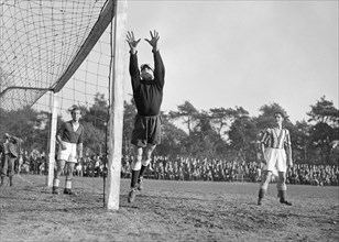 1940s men's soccer match - House high over at AGOVV goal October 10, 1947