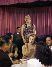 Woman signing at a jazz night club ca. 1948