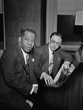 Portrait of Bernie Benjamin and George (George David) Weiss in their office, New York, N.Y., ca. Apr. 1947