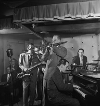 Portrait of Charlie Ventura, Curley Russell, Bill Harris, Ralph Burns, and Dave Tough, Three Deuces, New York, N.Y., ca. Apr. 1947