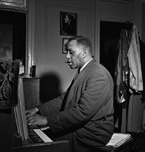 Portrait of Willie Smith in his apartment, ca. Jan. 1947