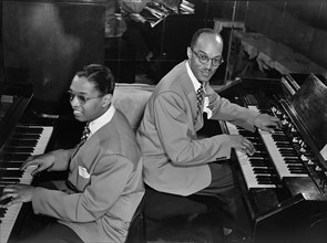 Billy Taylor and Bob Wyatt playing piano and organ ca. 1940s