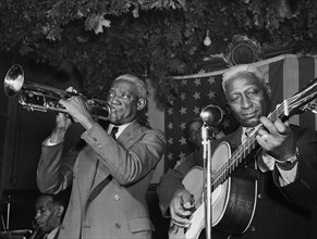 Portrait of Bunk Johnson, Leadbelly, George Lewis, and Alcide Pavageau, Stuyvesant Casino, New York, N.Y., ca. June 1946
