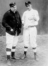 Photograph shows baseball player Richard William 'Rube' Marquard (1886-1980), who was a pitcher in Major League Baseball in the 1910s and early 1920s with outfielder and pitcher Libeus Washburn (1874-...