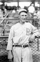 Ivan Massie Olson, Brooklyn baseball player, half-length portrait, standing, facing front, wearing baseball uniform 1916