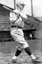 Robert William Meusel, New York Yankees outfielder, full-length portrait, facing right, swinging baseball bat 1920-1929