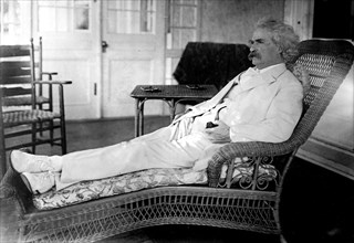 Samuel Clemens (Mark Twain) reclining in porch chair 4 15 1910