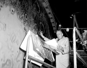 Artists used paintbrushes and airbrushes to recreate the lunar surface on each of the four models comprising the LOLA simulator.