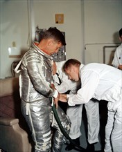 Astronaut Walter Schirra during suiting-up exercise prior to MA-8 flight