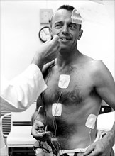 Astronaut Alan Shepard underwent a physical examination prior to the first marned suborbital flight.