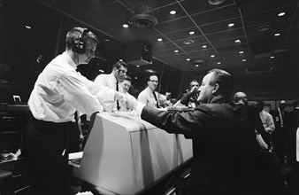 (23 March 1965) Vice President Hubert H. Humphrey (right) during visit to the Misson Control Center at Cape Kennedy during the Gemini-3 mission.