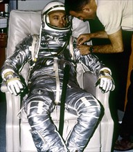 1961 - Astronaut Alan B. Shepard, Jr. during suiting for the first manned suborbital flight, MR-3 mission.